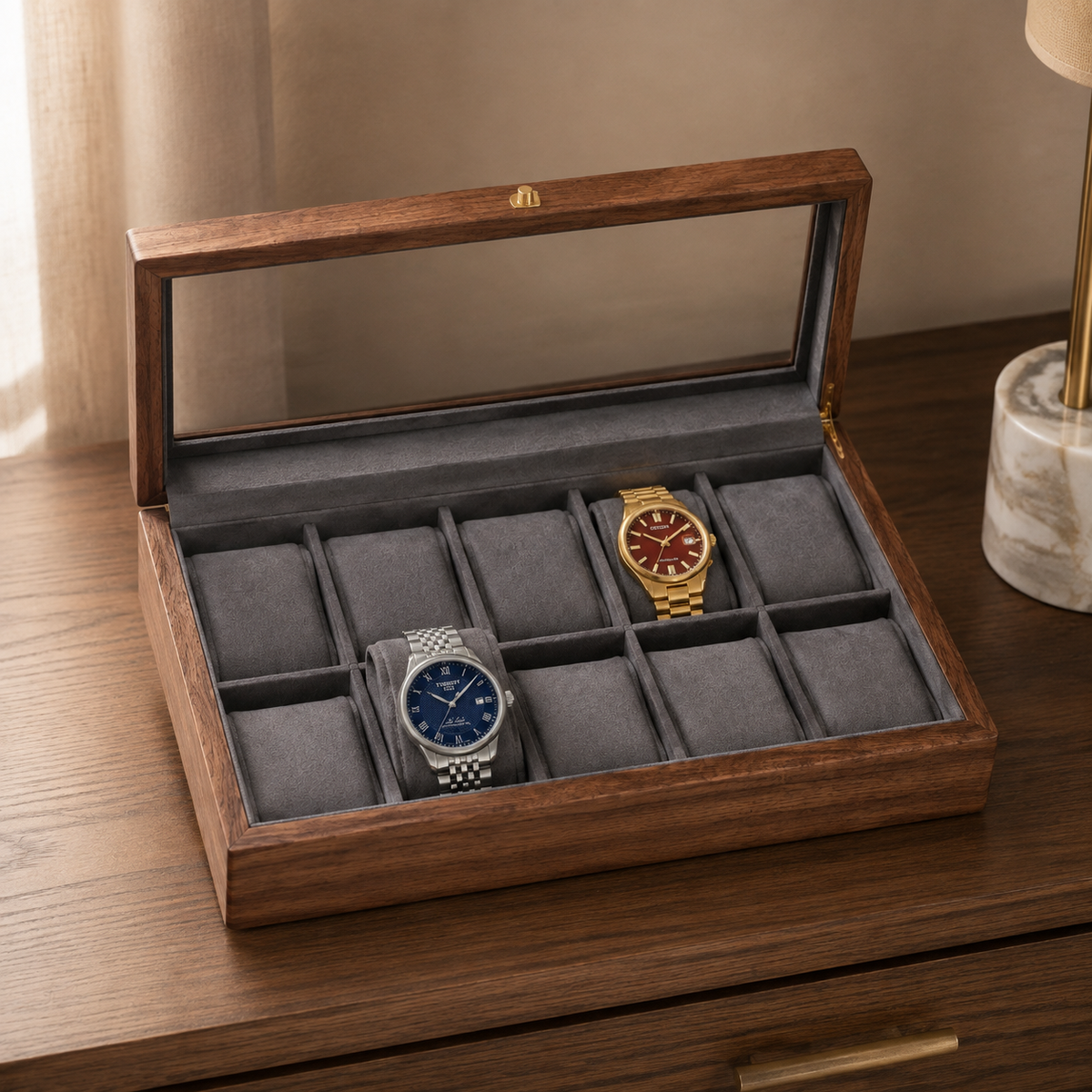 Pollux walnut box open on a dresser, ten cushions carrying watches under the lid