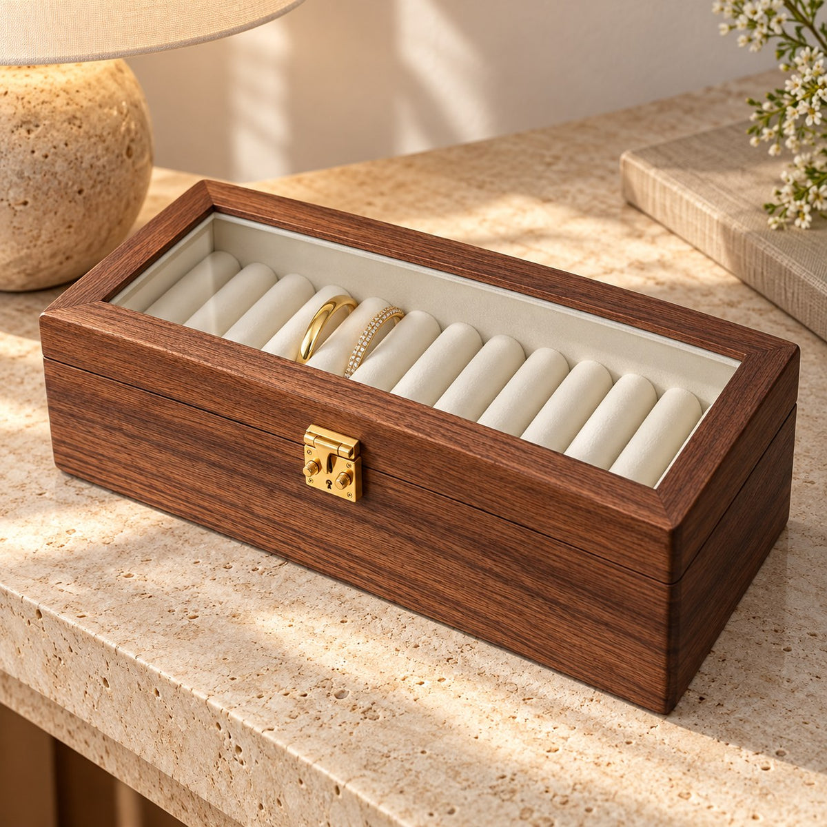 Anella Walnut Bangle Box in Transparent Glass / 12-Compartment, on a sideboard in natural light #Lid Style_Transparent Glass|Compartment_12-Compartment