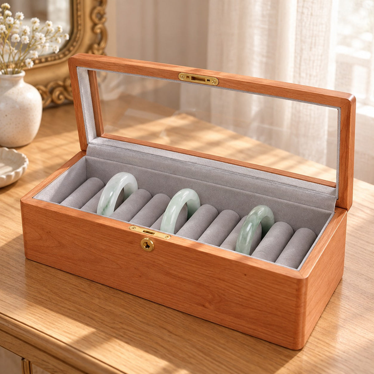 Armilla Glass Bangle Box in Cherry / Glass Lid / 10 Slots, on a dressing table #Wood_Cherry|Style_Glass Lid|Size_10 Slots