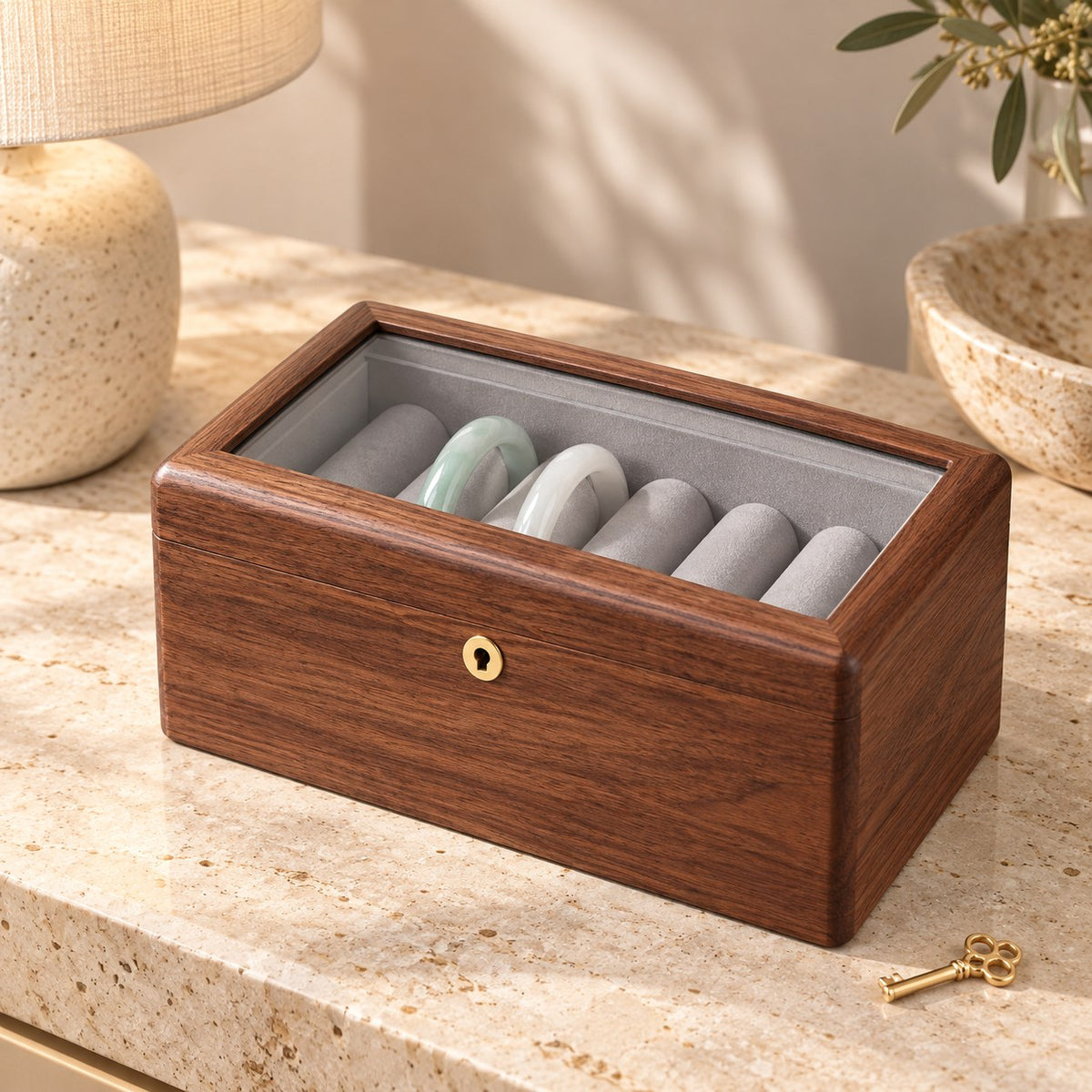 Armilla Glass Bangle Box in Walnut / Glass Lid / 6 Slots, on a sideboard in natural light #Wood_Walnut|Style_Glass Lid|Size_6 Slots