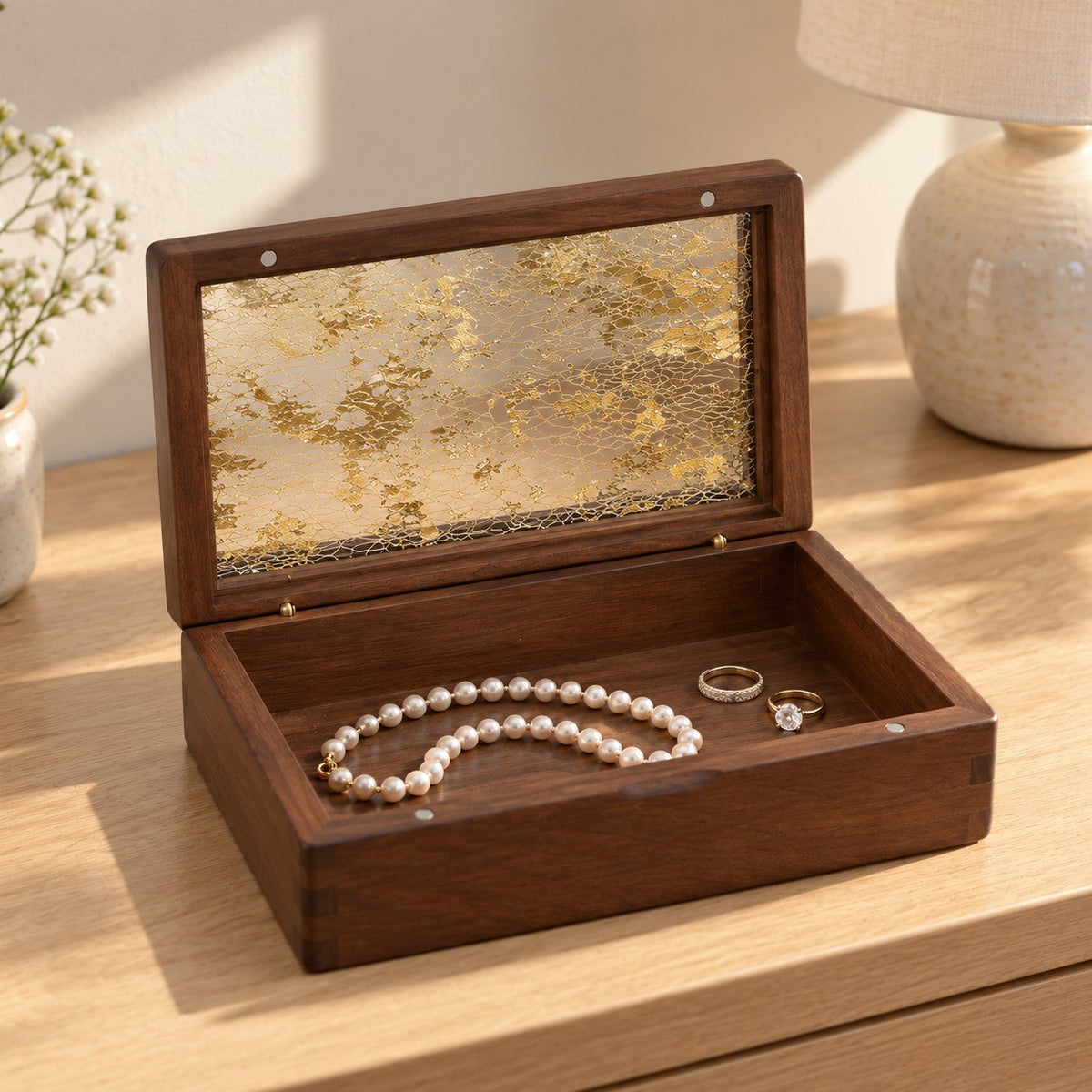 Aurata Gilded Jewellery Box, on a sideboard in natural light