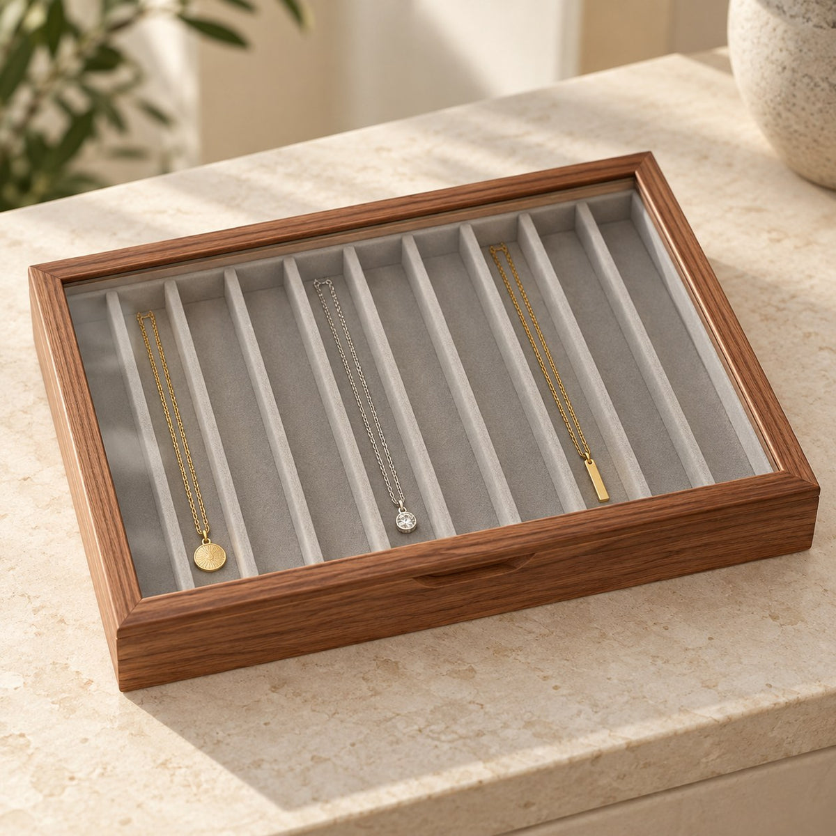 Clarea Glass Jewellery Box in Walnut / Grey, on a sideboard in natural light #Wood_Walnut|Lining Colour_Grey