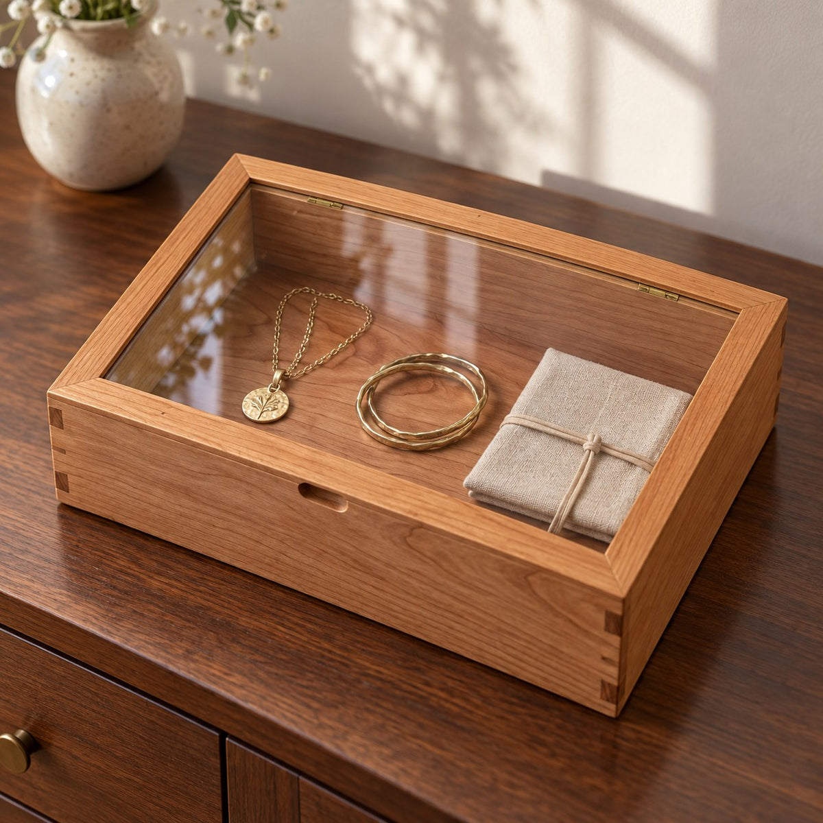 Hyalina Glass Jewellery Box in Cherry / Large, on a sideboard in natural light #Wood_Cherry|Size_Large