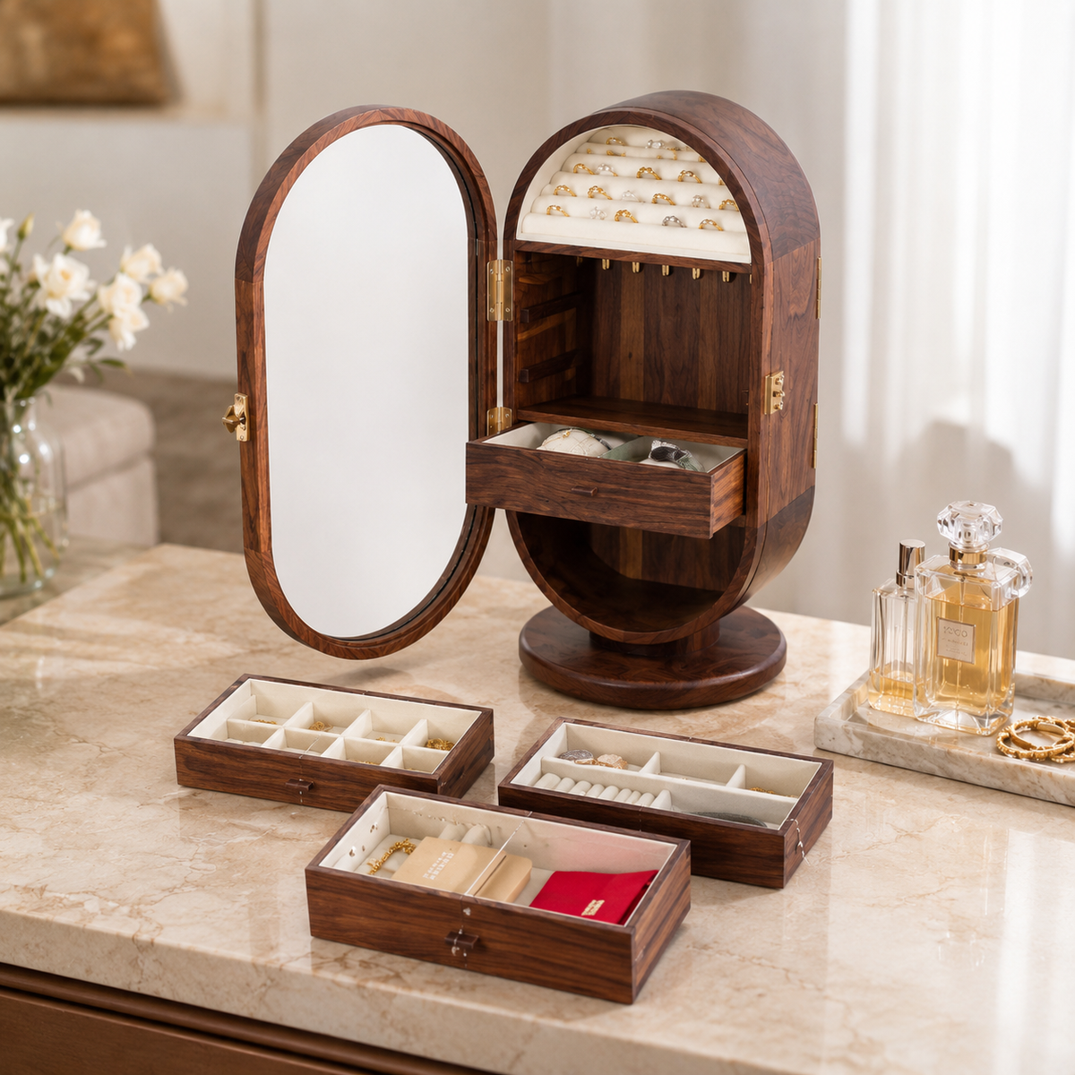 Circina cabinet open beside its three removable walnut trays on a marble top