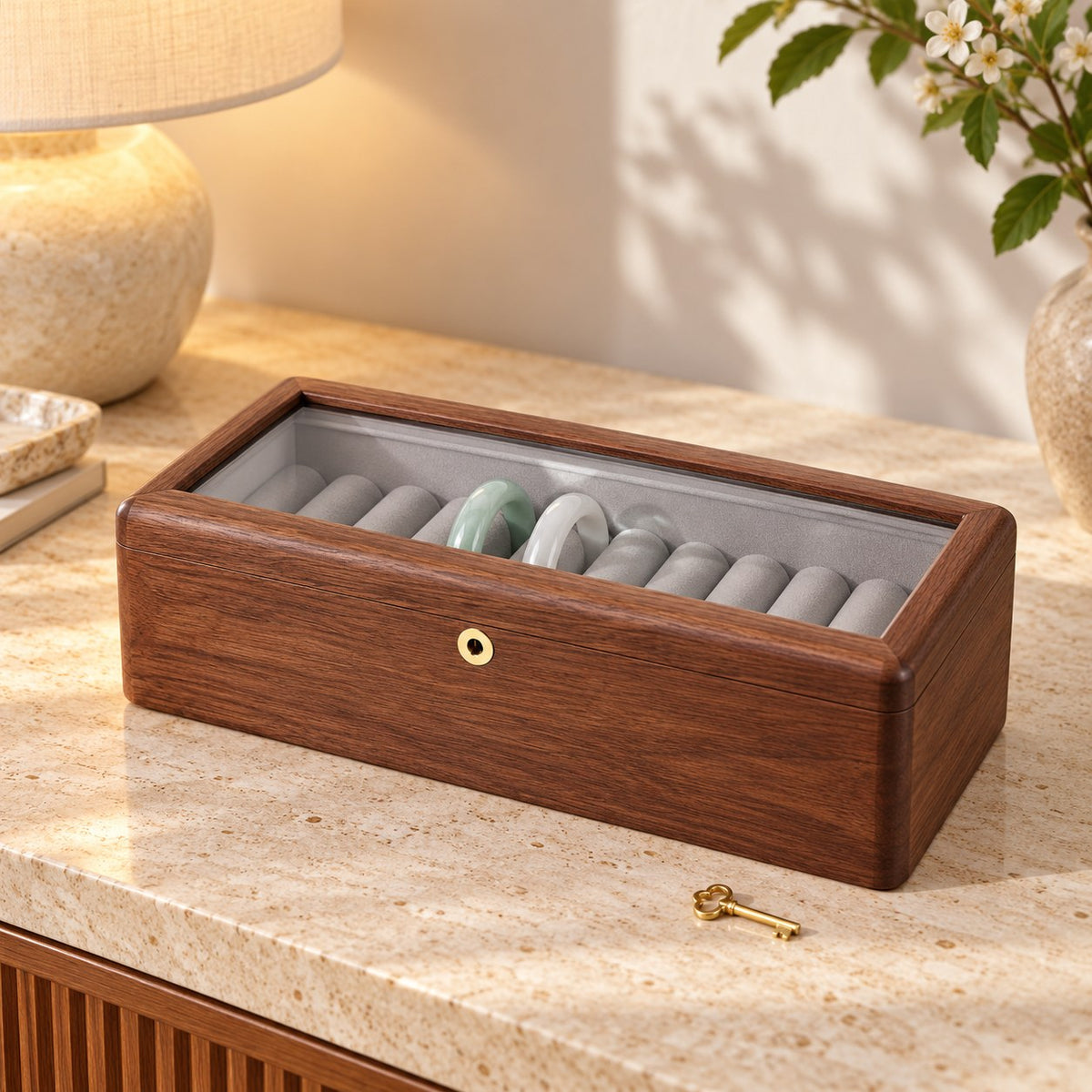 Armilla Glass Bangle Box in Walnut / Glass Lid / 10 Slots, on a sideboard in natural light #Wood_Walnut|Style_Glass Lid|Size_10 Slots